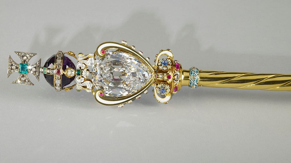 The Sovereign's Sceptre with Cross, 1661 (RCIN 31712). A gold rod topped with a large diamond and cross.