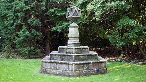 A sundial originally placed in the centre of the King's Garden at Holyrood, coinciding with Charles I's Scottish coronation at the Abbey of Holyrood (RCIN 44869). A sun dial on a lawn