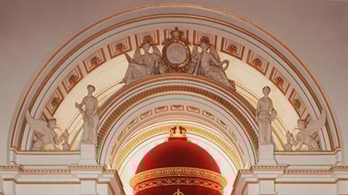 Statues stand on top of a triumphal arch, flanked by sphinxes and enclosing the throne canopy. Throne Canopy